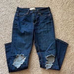 Free people busted knee skinny jeans.